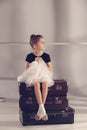 The little girl as balerina dancer sitting at studio Royalty Free Stock Photo