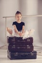 The little girl as balerina dancer sitting at studio Royalty Free Stock Photo