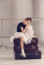 The little girl as balerina dancer sitting at studio Royalty Free Stock Photo