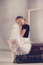 The little girl as balerina dancer sitting at studio Royalty Free Stock Photo