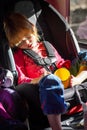 Little Girl Asleep and Drooling in Her Carseat on a Roadtrip Royalty Free Stock Photo