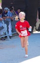 Little girl athlete running