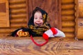 Little girl with bagels winter