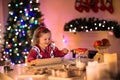 Little girl baking Christmas pastry. Royalty Free Stock Photo