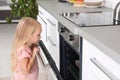 Little girl baking cookies at home Royalty Free Stock Photo