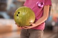 Little girl with ball in bowling club Royalty Free Stock Photo