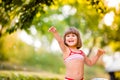 Little girl with ball in the garden swimming pool. Royalty Free Stock Photo