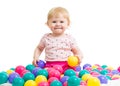 Little girl in ball pit woth colored balls Royalty Free Stock Photo