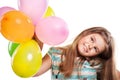 Little girl with balloons on a white background