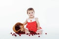 Little girl with a basket of cherries berries Royalty Free Stock Photo