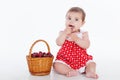 Little girl with a basket of cherries berries Royalty Free Stock Photo