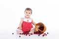 Little girl with a basket of cherries berries Royalty Free Stock Photo