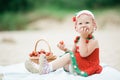 Little girl with basket full of strawberries Royalty Free Stock Photo