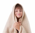 Little girl is basking under a blanket Royalty Free Stock Photo