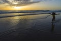 Little girl bathing on the beach at dusk Royalty Free Stock Photo