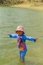 Little girl bathing in the sea