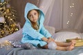 Little girl in bathrobe. Christmas Royalty Free Stock Photo
