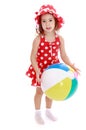 Little girl on the beach with big inflatable ball Royalty Free Stock Photo