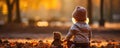 Little girl with bear playing in the park