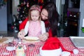 Little girl with beautiful mother baking Christmas Royalty Free Stock Photo