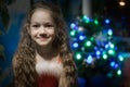 A little girl with a beautiful smile. Blond Haired Child Celebrating Christmas Royalty Free Stock Photo