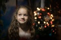 A little girl with a beautiful smile. Blond Haired Child Celebrating Christmas Royalty Free Stock Photo