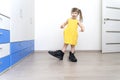 Little girl in big daddy boots