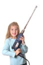 Little girl with big drill Royalty Free Stock Photo