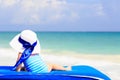 Little girl in big hat on summer beach Royalty Free Stock Photo