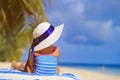 Little girl in big hat on summer beach Royalty Free Stock Photo