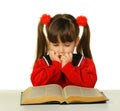 The little girl before the big scientific book Royalty Free Stock Photo