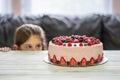 Little girl birthday cake.Home made cake with berries. Cake with Strawberry, blackberry, blueberry, and raspberry on a table Royalty Free Stock Photo