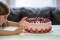 Little girl birthday cake.Home made cake with berries. Cake with Strawberry, blackberry, blueberry, and raspberry on a table Royalty Free Stock Photo