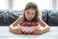 Little girl birthday cake.Home made cake with berries. Cake with Strawberry, blackberry, blueberry, and raspberry on a table Royalty Free Stock Photo