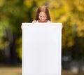 Little girl with blank white board Royalty Free Stock Photo