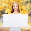 Little girl with blank white board Royalty Free Stock Photo