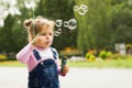 Little girl blow bubbles Royalty Free Stock Photo