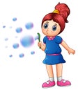 Little girl blowing bubbles