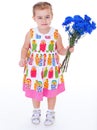 Little girl with blue flowers Royalty Free Stock Photo