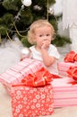 Little girl with boxes of presents