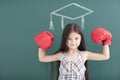 girl with boxing gloves and graduation concept Royalty Free Stock Photo