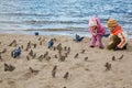 Little girl and boy play beach in autumn day Royalty Free Stock Photo