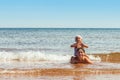 Little girl and boy playing on the beach Royalty Free Stock Photo