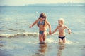 Little girl and boy in the sea Royalty Free Stock Photo