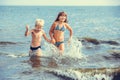 Little girl and boy in the sea Royalty Free Stock Photo