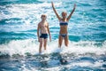 Little girl and boy in the sea Royalty Free Stock Photo