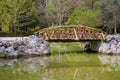 Little girl on the bridge in Central park in Athens, Greece