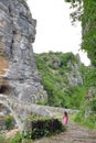 A little girl on a bridge in the national park of Vikos-Aoos in Greece Royalty Free Stock Photo