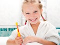 Little girl brushing teeth