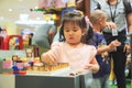 Little girl build a tower and funny with educational toy blocks Royalty Free Stock Photo